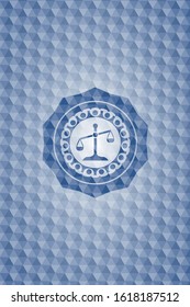 scale icon inside blue emblem with geometric pattern background.