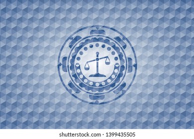 scale icon inside blue polygonal emblem.