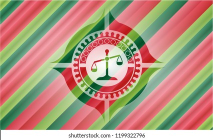 scale icon inside christmas emblem.