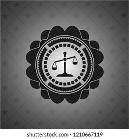 scale icon inside dark badge or emblem
