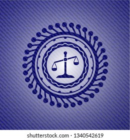 scale icon inside emblem with denim texture
