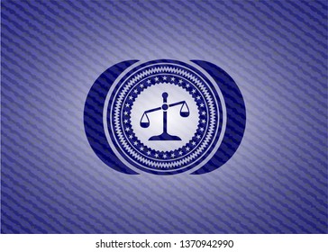 scale icon inside emblem with denim texture