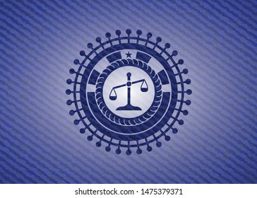 scale icon inside emblem with denim high quality background