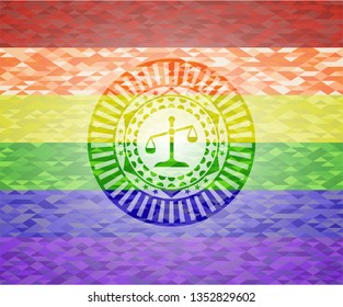 scale icon inside emblem on mosaic background with the colors of the LGBT flag