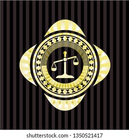 scale icon inside gold emblem