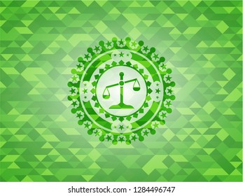 scale icon inside green emblem with mosaic ecological style background