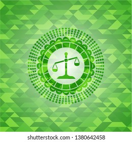 scale icon inside green emblem. Mosaic background