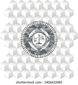scale icon inside grey badge with geometric cube white background