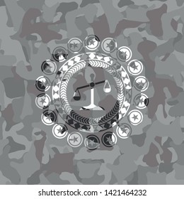 scale icon inside grey camouflage texture