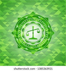 scale icon inside realistic green mosaic emblem