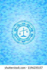 scale icon inside realistic light blue mosaic emblem