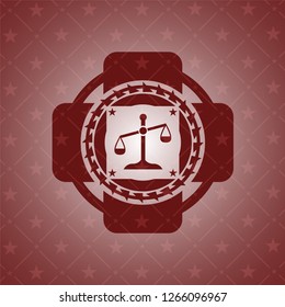 scale icon inside realistic red emblem