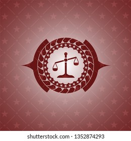 scale icon inside realistic red emblem