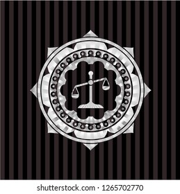 scale icon inside silver shiny emblem