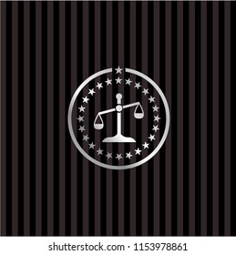 scale icon inside silvery badge or emblem