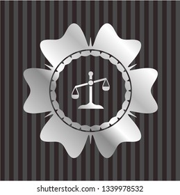 scale icon inside silvery shiny emblem