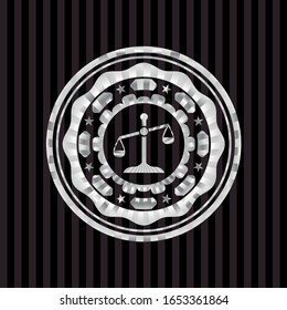 scale icon inside silvery shiny emblem