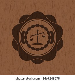 scale icon inside vintage wood emblem