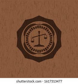 scale icon inside wooden emblem. Retro