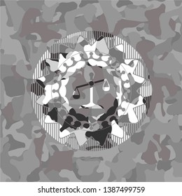 scale icon on grey camo texture