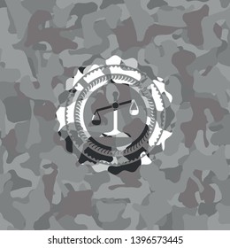 scale icon on grey camouflaged texture