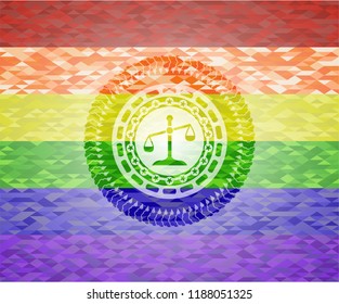 scale icon on mosaic background with the colors of the LGBT flag