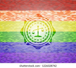 scale icon on mosaic background with the colors of the LGBT flag