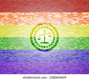 scale icon on mosaic background with the colors of the LGBT flag