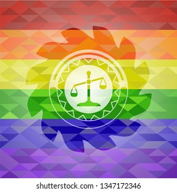 scale icon on mosaic background with the colors of the LGBT flag