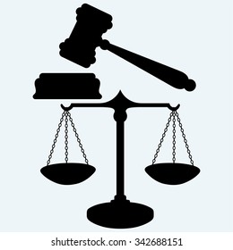 Scale and judge gavel. Isolated on blue background. Vector silhouettes