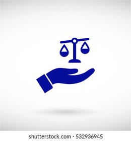 scales in hand icon
