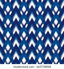 Scales seamless pattern. Repeated chevrons motif. Hand drawn doodle traditional oriental asian ornament. Classic geometric surface print. Freehand brush design texture. Vector abstract background