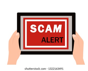 Scam Alert text written on tablet. Business concept for Scam Alert white background.Close up image of hand holding tablet.