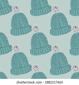 Scandi seamless pattern with blue season xmas hats. Pale background. Winter backdrop. Graphic design for wrapping paper and fabric textures. Vector Illustration.