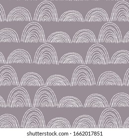 Scandinavian abstract geometric seamless pattern with hand drawn dotted archs, waves, semicircles. Stylized hill rows. Cute artistic texture, background for fabric baby print, wallpaper, cards.