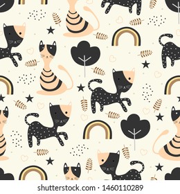 Scandinavian cats seamless pattern for autumn theme trendy yellow and black background. Nordic style good for baby and kids fashion textile print.
