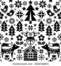 Scandinavian Christmas black and white folk art seamless vector pattern wtih reindeer, birds, snowflakes and flowers, festive Nordic decoration. Xmas repetitive cute vector monochrome background