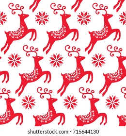 Scandinavian folk art Christmas vector pattern, Nordic red seamless design with reindeer and snowflakes

Xmas cute vector wallpaper, Norwegian repetitive background

