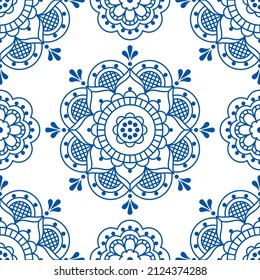 Scandinavian folk art style vector seamless pattern with flowers, decorative textile or fabric print design in navy blue on white background. Traditional repetitive line art background