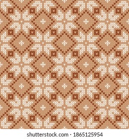 Scandinavian knitted seamless pattern. Norwegian native style sweater. Wool texture. Winter holiday background. Vector illustration with snowflakes.