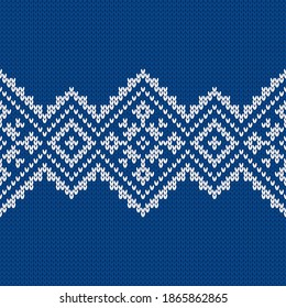 Scandinavian knitted seamless pattern. Norwegian native style sweater, ornament with snowflakes. Fair Isle design. Wool texture. Winter holiday background. Vector illustration.