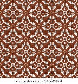 Scandinavian knitted seamless pattern. Norwegian native style sweater. Wool pattern. Winter holiday background. Vector illustration with snowflakes.
