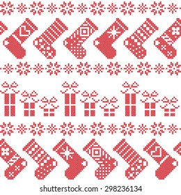 Scandinavian Nordic Christmas pattern with stockings, stars, snowflakes, presents in cross stitch in red 
