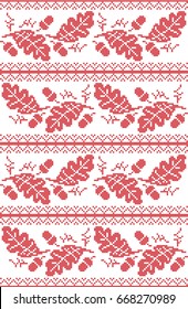 Scandinavian and Norwegian folk inspired festive autumn seamless pattern in cross stitch with acorn, oak leaf and  ornaments in red and white
