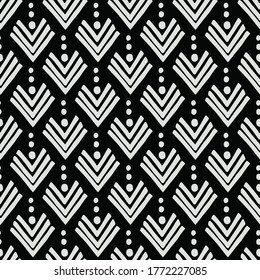 Scandinavian seamless geometric pattern of corners and dots in black and white. Suitable for the design of Wallpaper, poster, clothing, textiles, packaging paper. Chevron