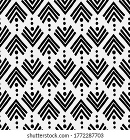 Scandinavian seamless geometric pattern of corners and dots in black and white. Suitable for the design of Wallpaper, poster, clothing, textiles, packaging paper. Chevron
