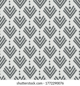 Patrón geométrico sin fisuras escandinavo de esquinas y puntos en gris y blanco. Adecuado para el diseño de papel tapiz, afiche, ropa, textiles, papel de embalaje. Chevron