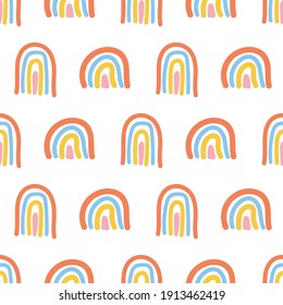 Scandinavian seamless pattern with hand-drawn rainbows, love, and clouds. Creative kids style texture for fabric, wrapping, 
textile, wallpaper, apparel. Surface pattern design.