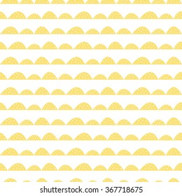 Scandinavian seamless yellow pattern in hand drawn style. Stylized hill rows. Wave simple pattern for fabric, textile and baby linen.