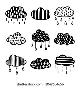Scandinavian style hand drawn clouds set. Monochrome nursery decorative elements collection. Minimalistic cute drawings for prints, stickers, posters. Vector vintage illustration.